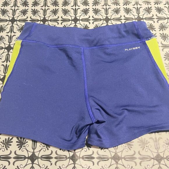 Reebok
- Girls purple / neon yellow spandex shorts - Picture 2 of 6